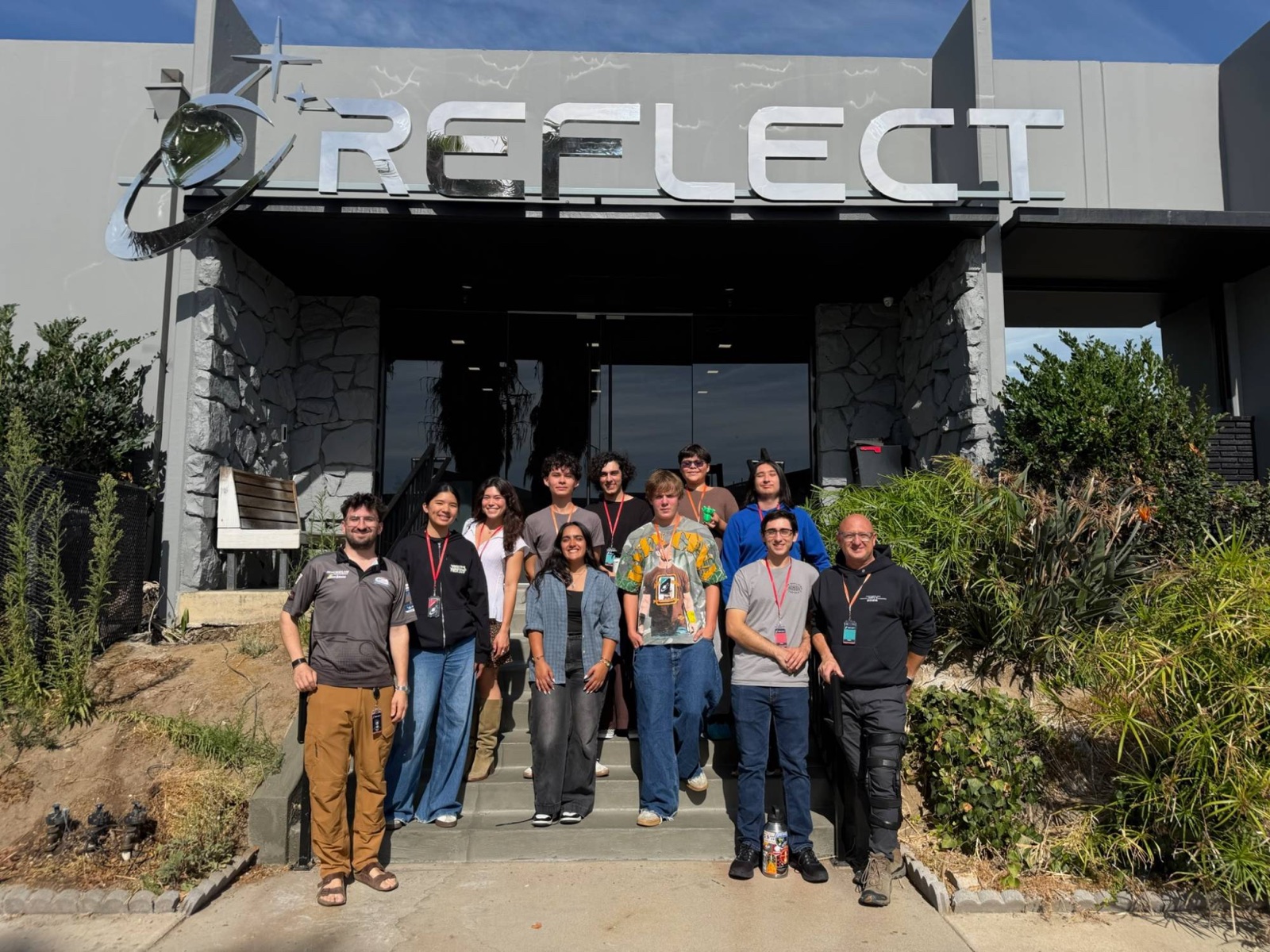 The summer cohort on the steps outside Reflect Orbital