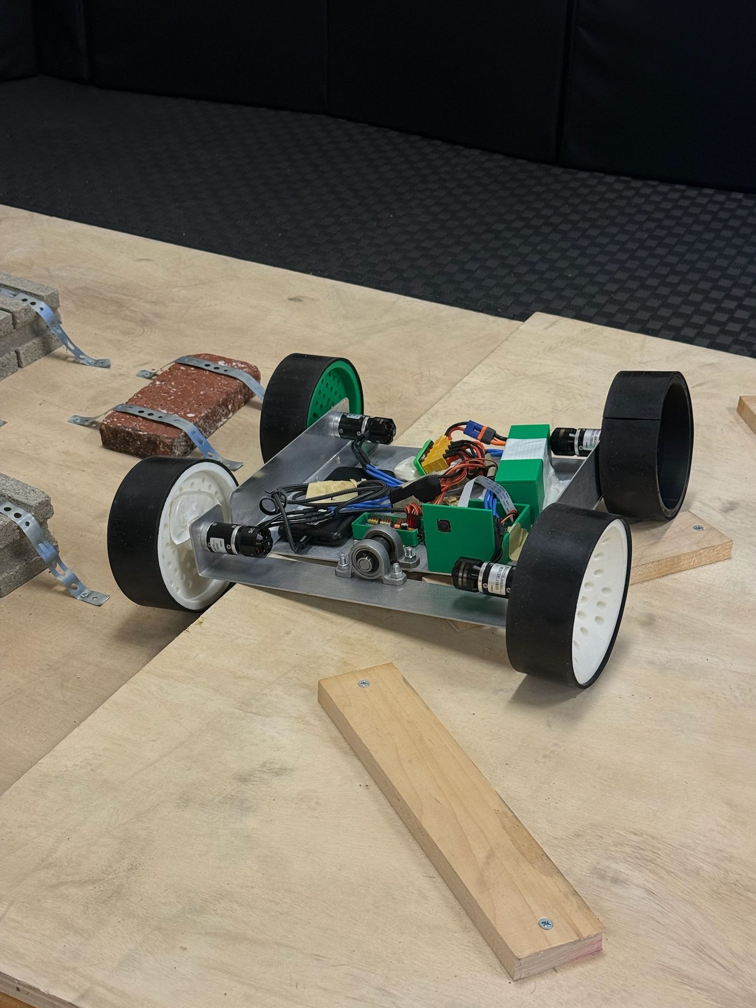 A student-built robot chassis with motors and electronics