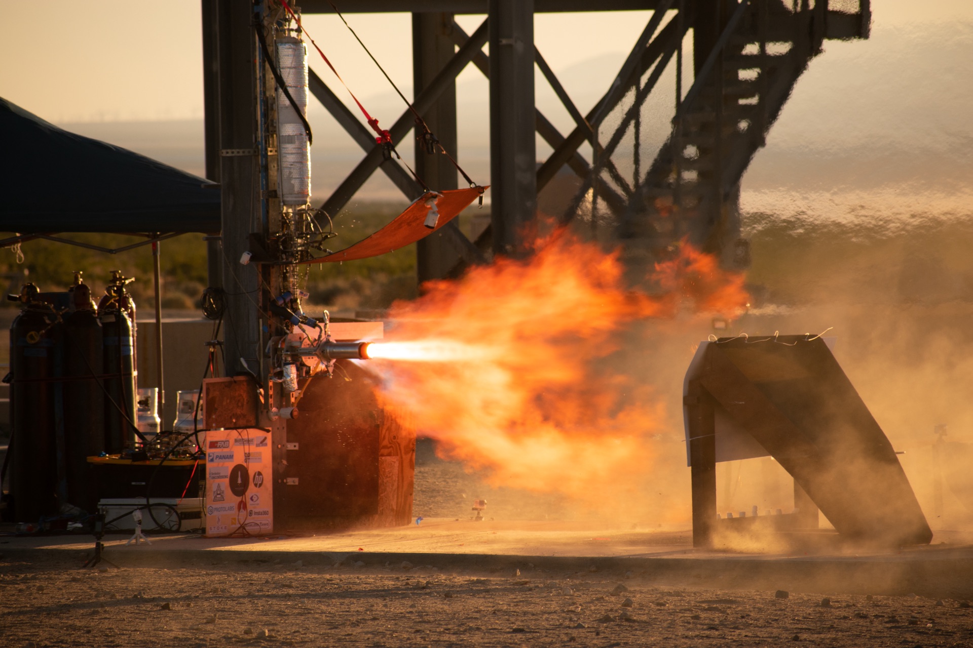 Collegiate team celebrating after a successful rocket milestone attempt