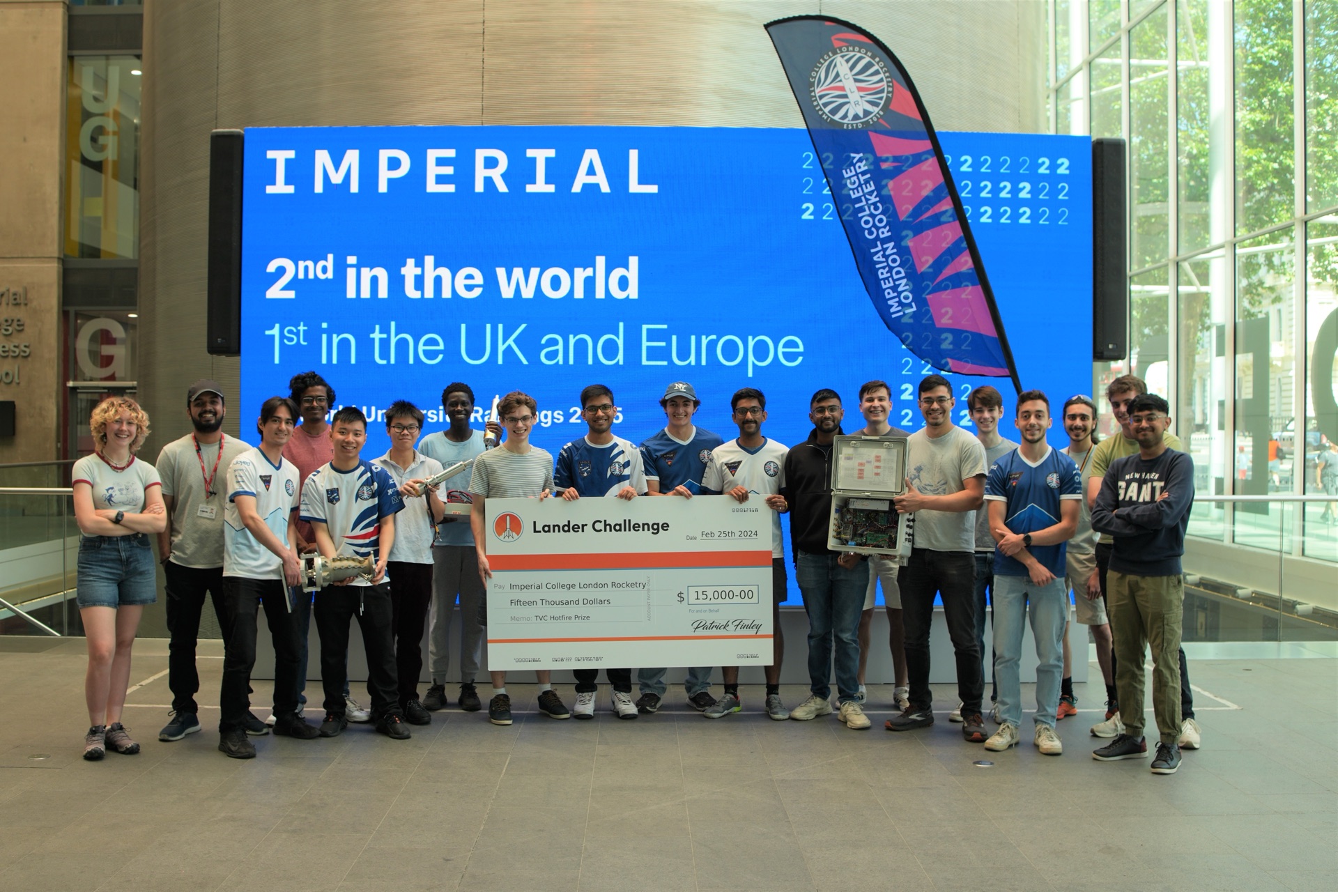 Imperial College London team holding a $15,000 Lander Challenge check — 2nd in the world, 1st in UK and Europe
