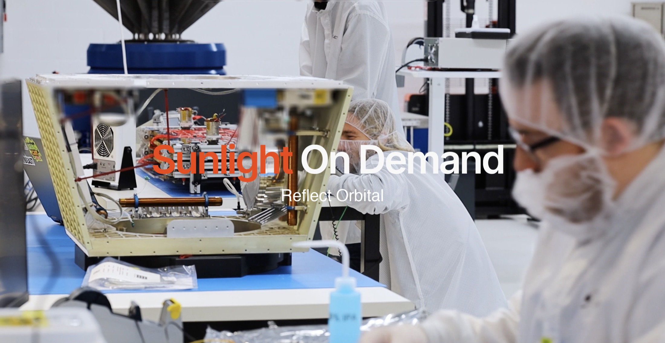 Engineers assembling hardware in the Reflect Orbital cleanroom